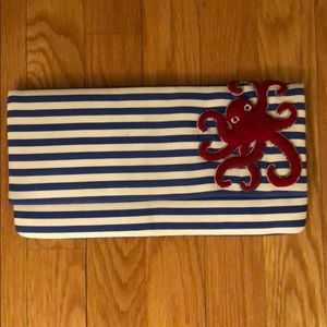 Blue and white striped clutch with octopus beading